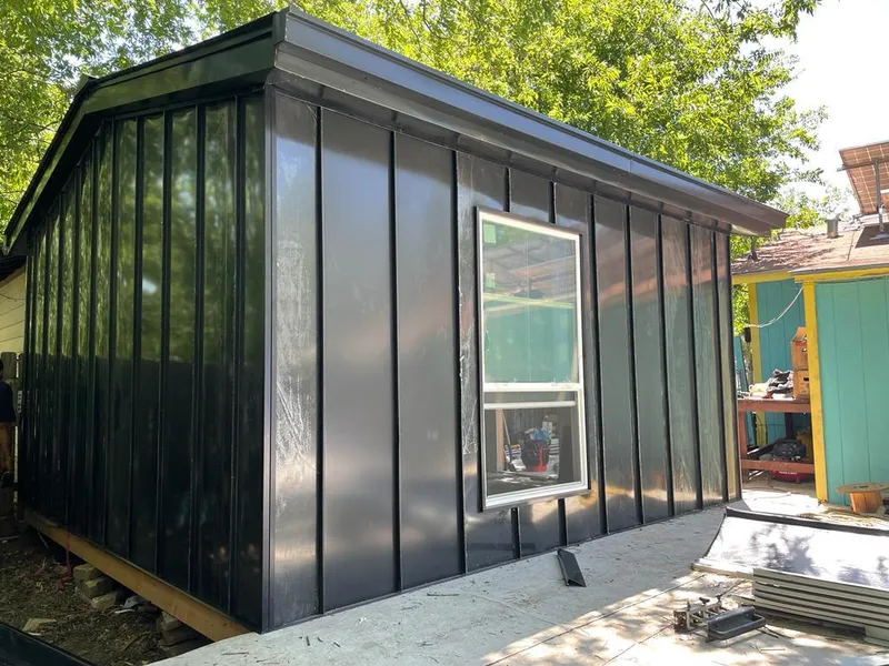 Black standing seam metal wall panels for Roof Inspection in Fruitville